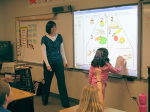 We use modern technology such as SmartBoards to assist and improve classroom learning.